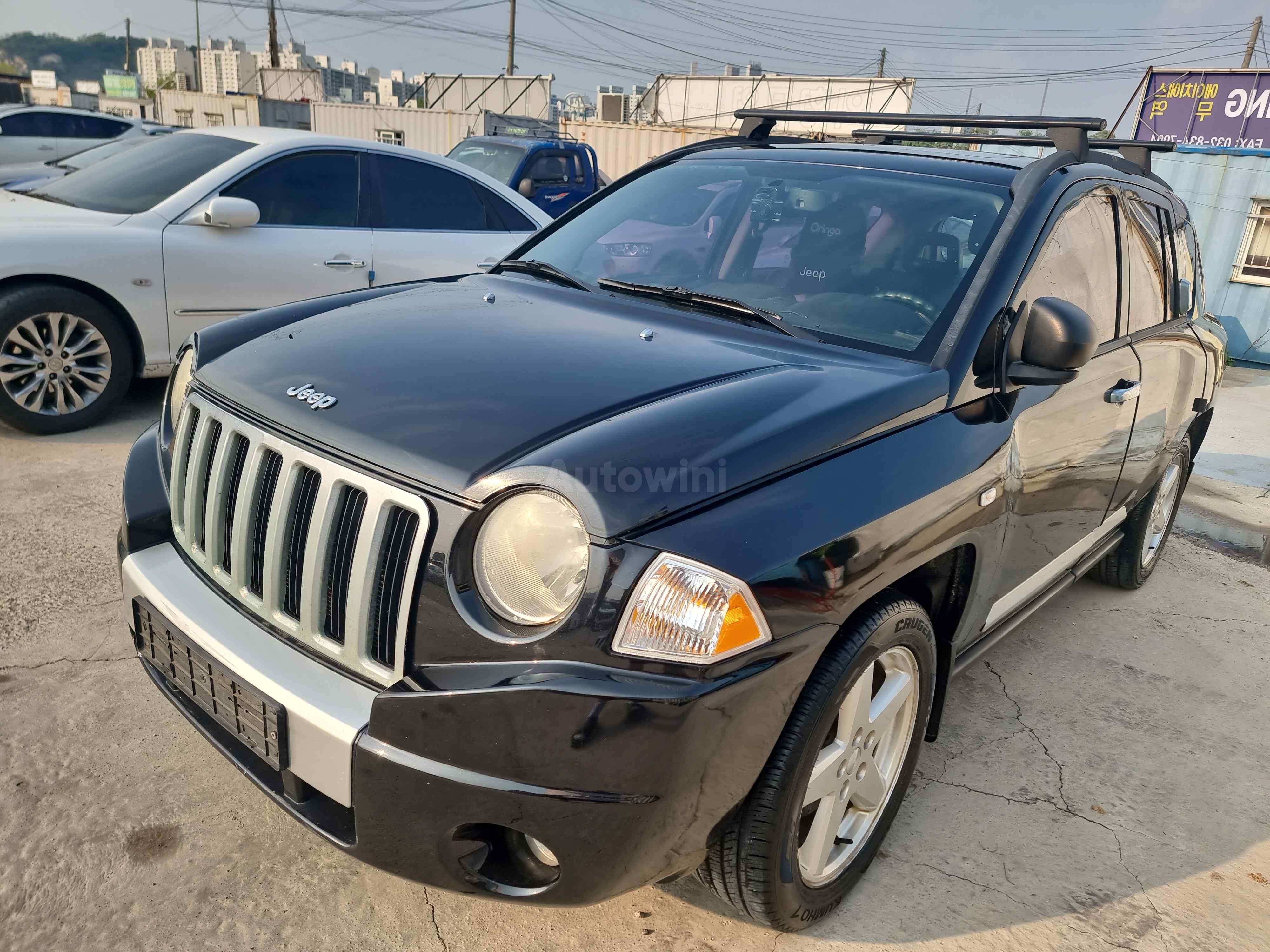 2010 JEEP COMPASS VIN: 1J4NF5FB5AD563141