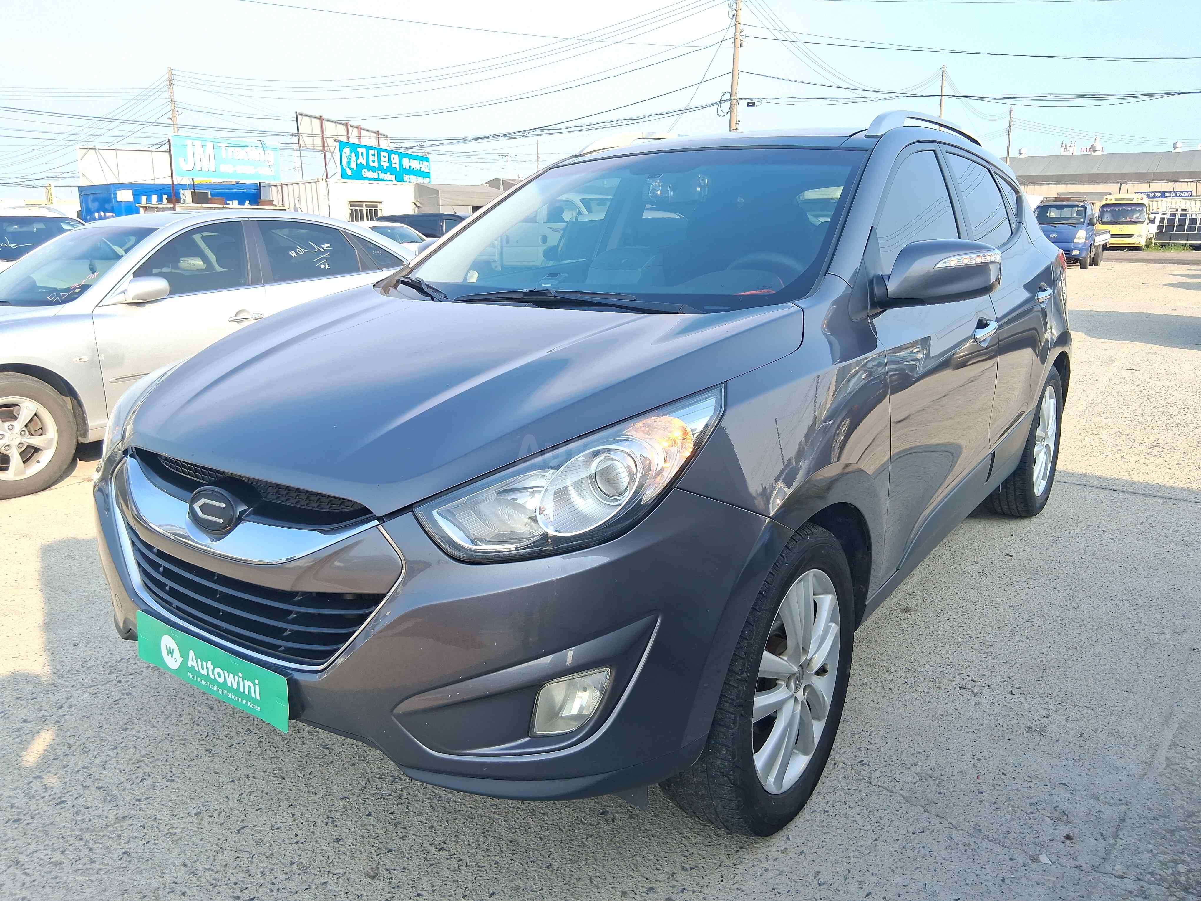 2010 HYUNDAI TUCSON VIN: KMHJW81VBAU007855