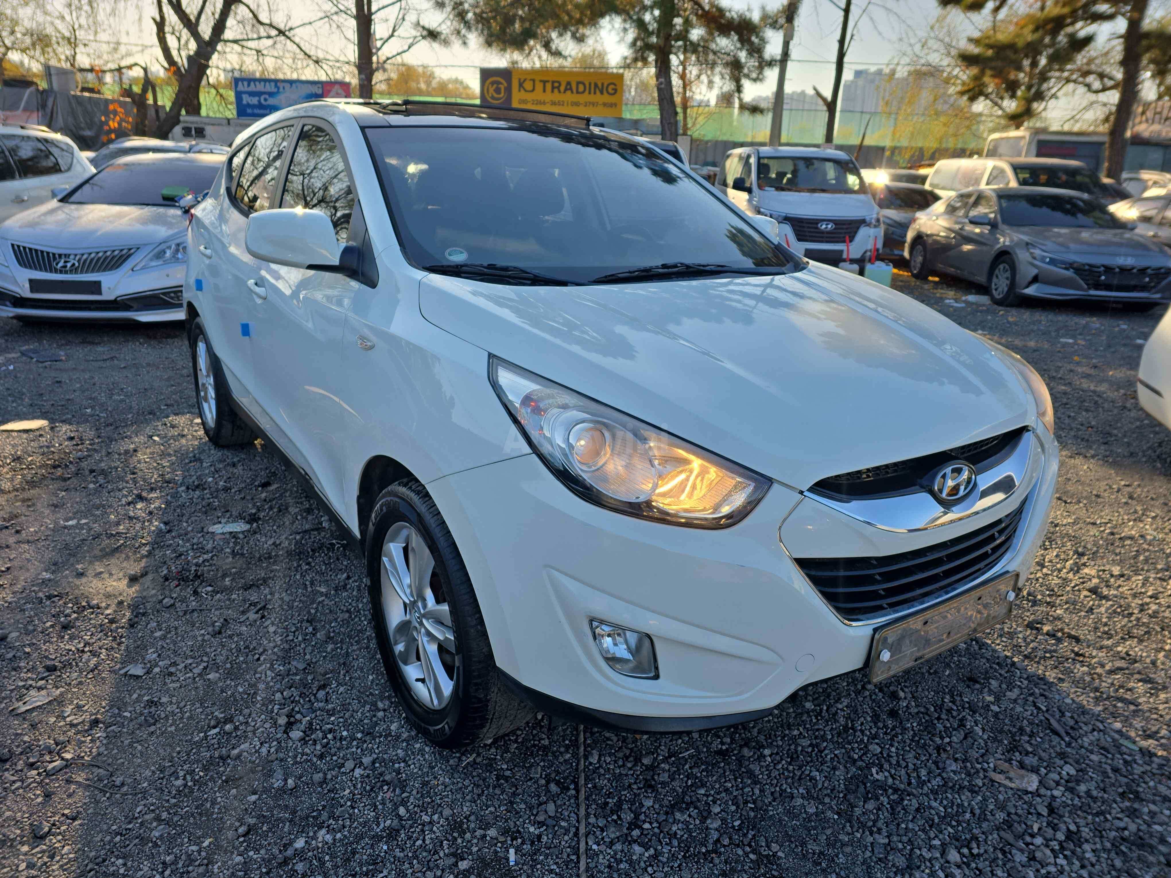 2012 HYUNDAI TUCSON VIN: KMHJT81VBCU339686