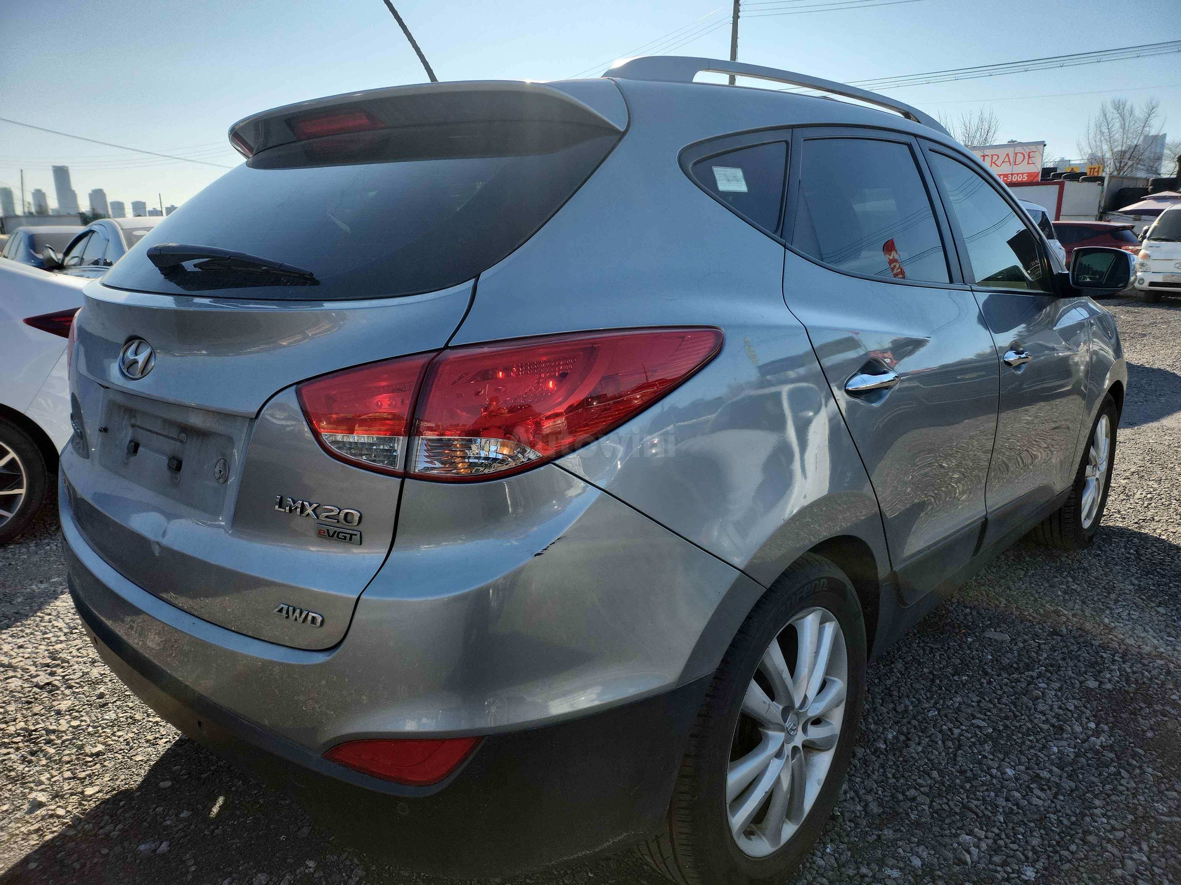 2011 HYUNDAI TUCSON VIN: KMHJW81VDBU131027